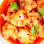 Assiette de chou-fleur à la tomate,oignon et paprika
