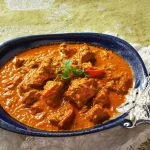 Assiette de curry de chèvre